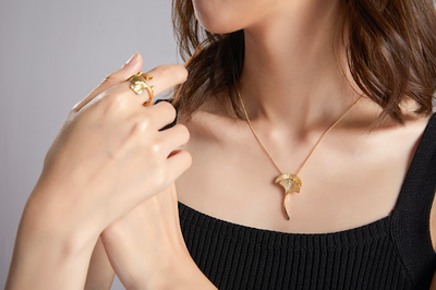 How To Style Your Charm Necklace Like a Pro